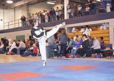 girl-practicing-high-kick